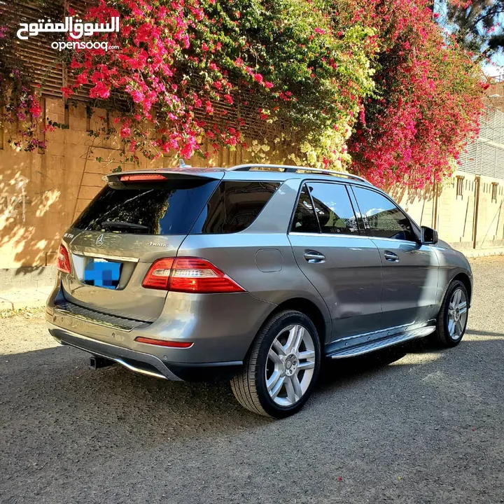 مرسيدس بنز ML3 2015 فل كامل رموش فتحه كراسي جلد خمس كيمرات رقم واحد وارد امريكا اقتصادي جدآ