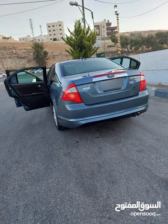 فورد فيوجن 2011 هايبرد استخدام شخصي كلين تايتل 4 جيد  ماتور وجير ونظام الهايبرد بدون اي مشاكل لون بت