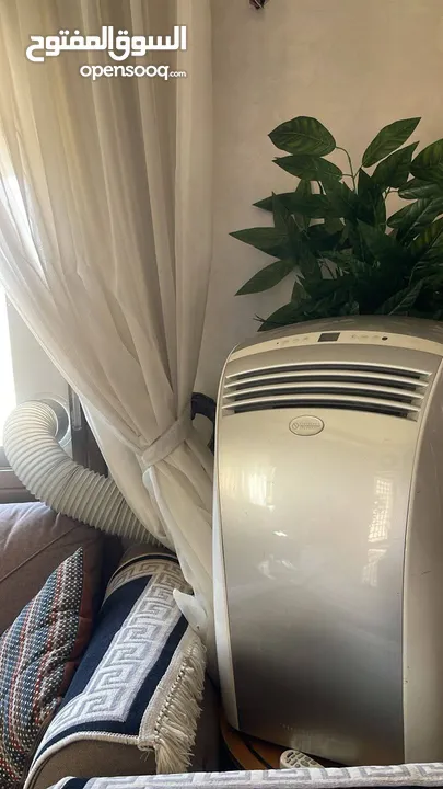 مكيف مكيفات انفنتر متنقل رقم التليفون بالاعلان  بحاله الوكاله مسطره وبايبي وريموت ومقفول شبه جديد