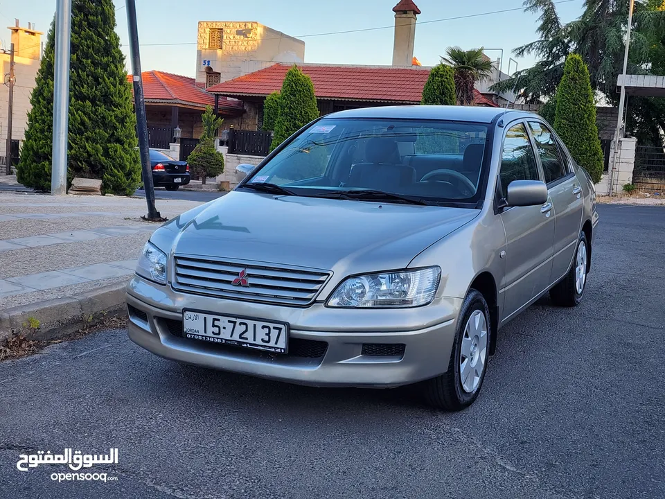 مستوبيشي لانسر 2003 محرك 1300جير عادي قتصادية جدا كاسير 4نجوم فحص كامل بسعر 4700