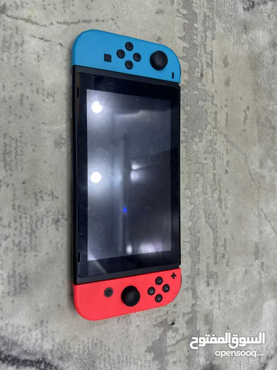Nintendo switch with controller and 3 games