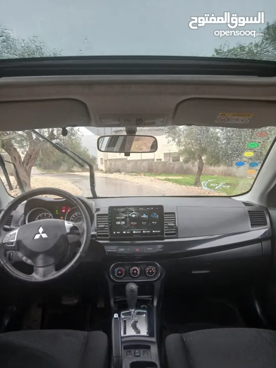 ميتسوبيشي لانسر. 2015 اصل برايفت   رخصة وتامين  ماطور 1600 اتومات  شامل  فتحة   اماكنية لبيع نص بنص