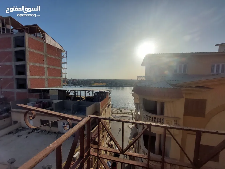 شقة للبيع مساحة (170م) + رووف مفتوح خاص (140م) - إطلالة عالية ورؤية مميزة على النيل