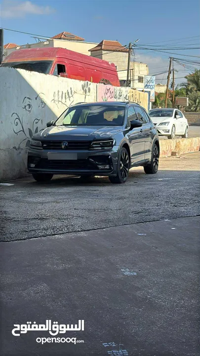 فولكس. فاجن تيجوان مطور 2000 ار لاين 4*4 فل اضافات كامل