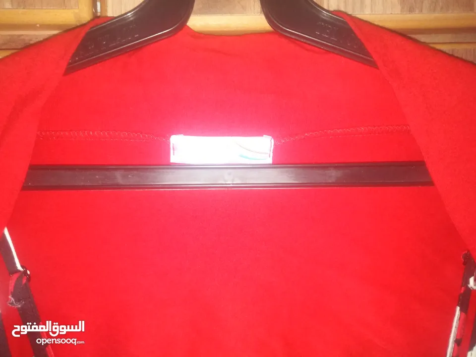 فستان اسود واحمر طويل مع جاكيت قصير احمر بأكمام طويلة جديد غير مستعمل ماركة H&M مقاس L بلبس 40 و42