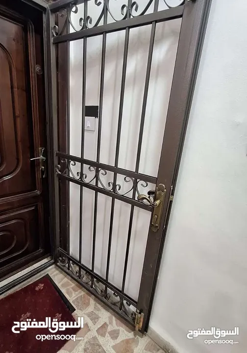,باب حديد حمايه وباب خشب
