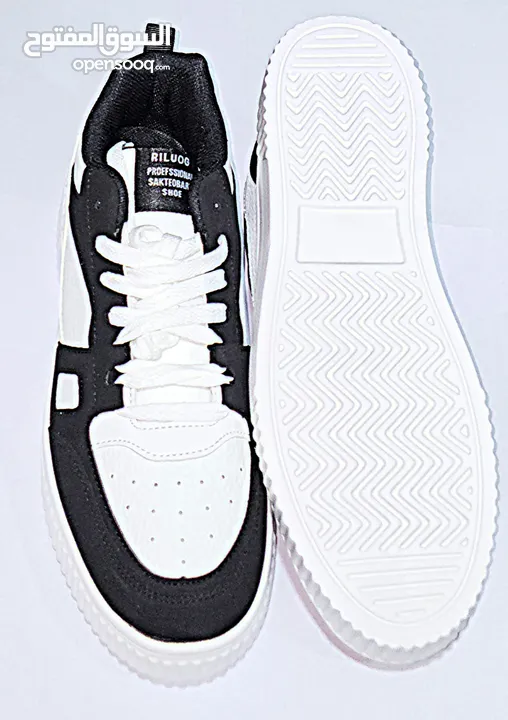 Black and white designer shoes size: 42 negotiable price FREE DELIVERY