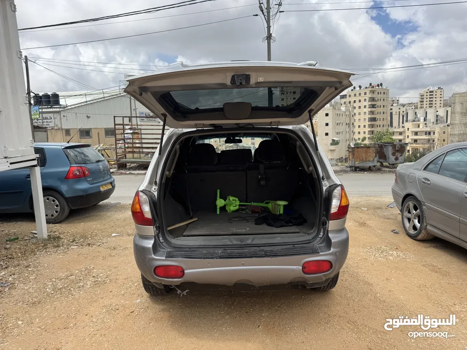 هيونداي سنتافيه فل اضافت ماعدا فتحة 7 ركاب اتوماتيك ديزل موديل 2002 فحص 100٪؜ خالي من المشاكل