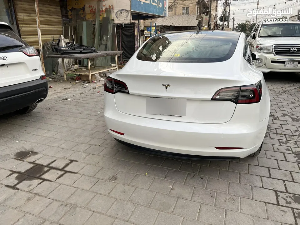 تسلا MODEL 3 موديل   2023 رقم بغداد الجديد