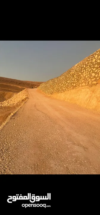 قطع (طابو)  مطلة على شارع المية(ممر عمان التنموي) وادي العش من المالك