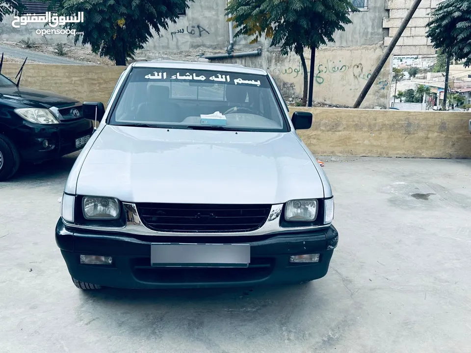 بيك اب ايسوزو 2003 KB / جمرك جديد /  اقساط دفعه أولى 2500