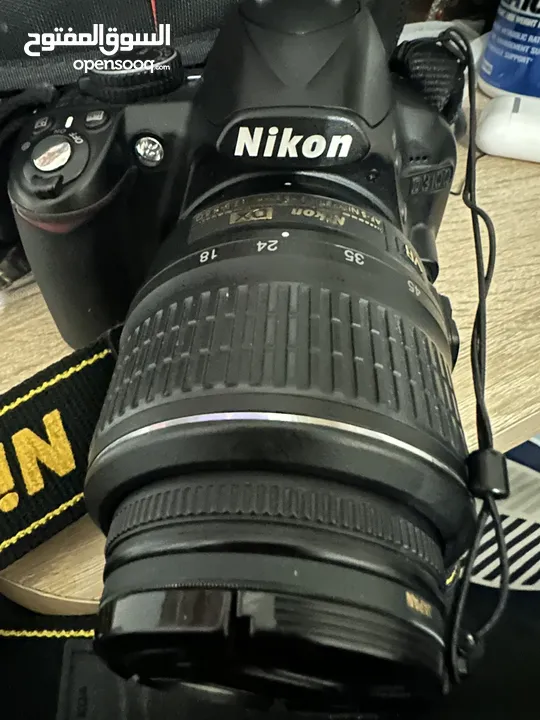 للبيع كاميراcanon400مع البطارية وشاحن بحالة ممتازة وكاميرا Nikon3100مع العدسة والبطارية بحالة ممتازة