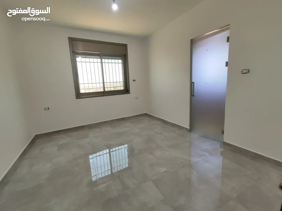شقة غير مفروشة تشطيب جديد بين الماصيون ورافات