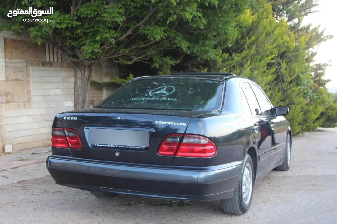 E200. 2002  قرش ونص 2002  رقم الهاتف بالوصف