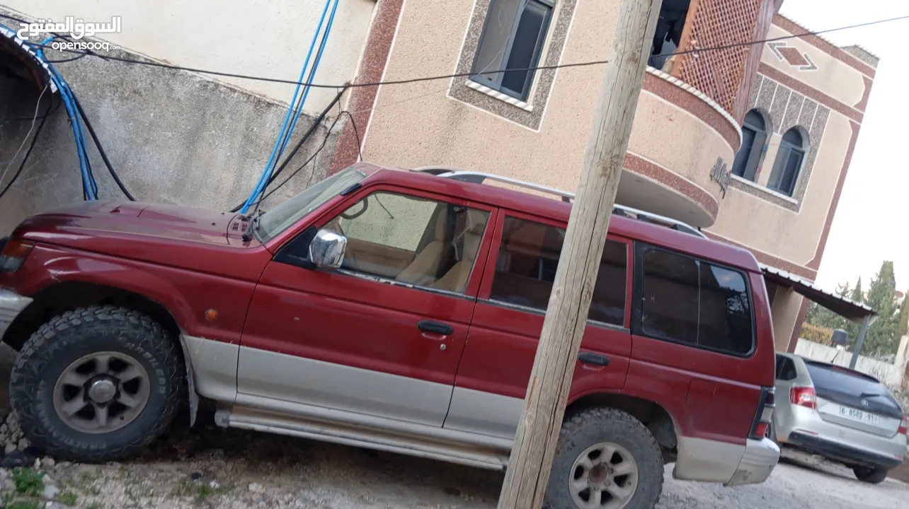 ميتسوبيشي باجيو1999  جير اتوماتيك 7 ركاب غرفه جلد عسليه  جير ومطور جاد مركبات