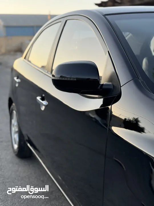 كيا فورتي للبيع بحالة ممتازه  Kia Forte 2013 لون اسود فحص كامل