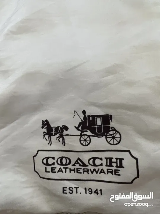 كوتش.   Coach bag