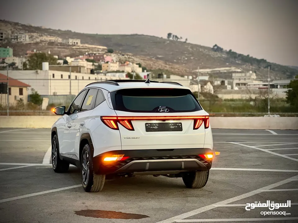 هونداي توسان 2023/ فل الفل فتحة سقف بانوراما  2x4 ///240Hp بنزين + كهرباء  ( Haybrid) 1600cc