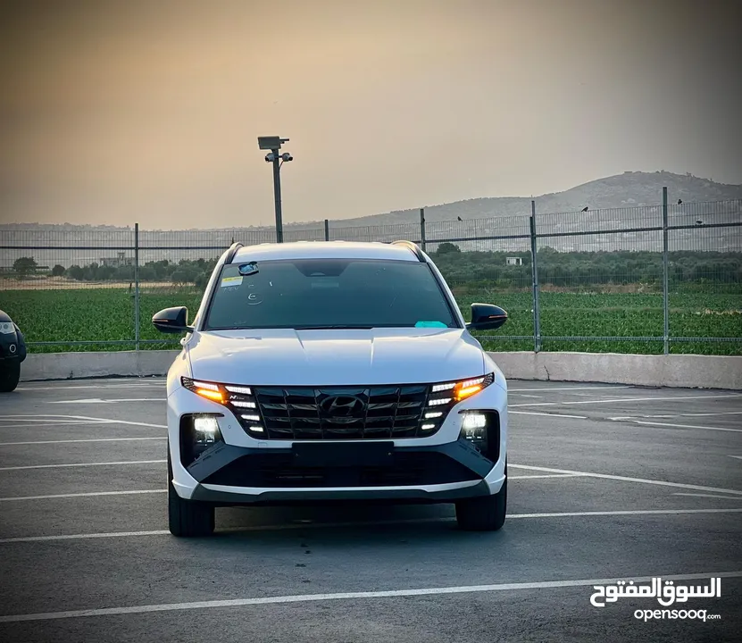 هونداي توسان  N-LINE  فل بدون فتحة  2x4 ///240Hp بنزين + كهرباء  2022/ ( Haybrid) 1600cc