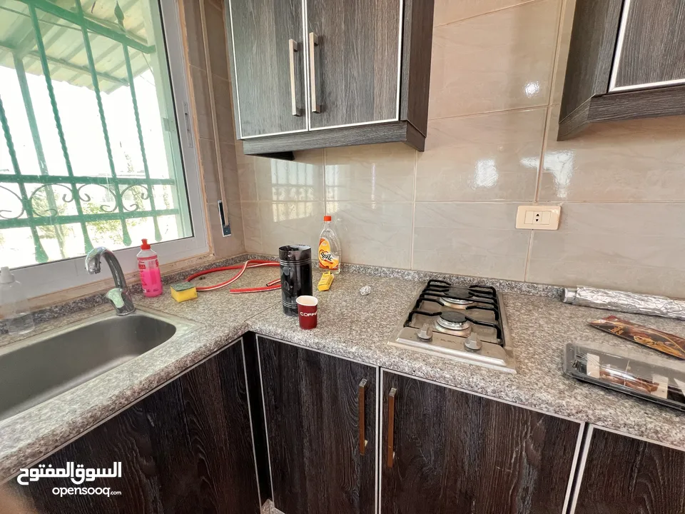قطعة أرض وبيتين  ومزرعه جاهز للسكن