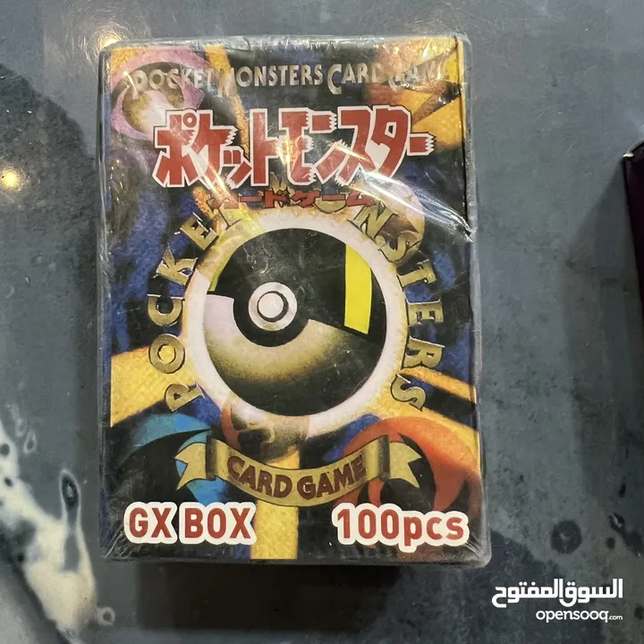 كروت بوكيمون والبومات (Pokemon cards and binders)