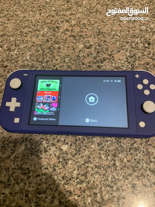 Nintendo switch lite for sale great condition, almost brand new, barely used, no cracks