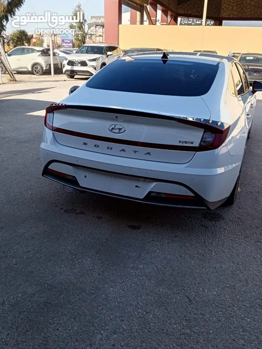 SONATA HYBRID 2020 ابيض لؤلؤي كوري  عداد 32 الف كيلو