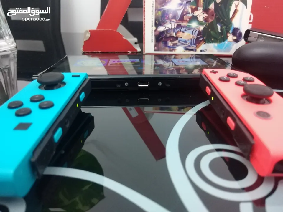 Nintendo Switch OLED - جهاز الألعاب المتطور مع شاشة OLED رائعة، أداء استثنائي وقابلية توسيع الذاكرة