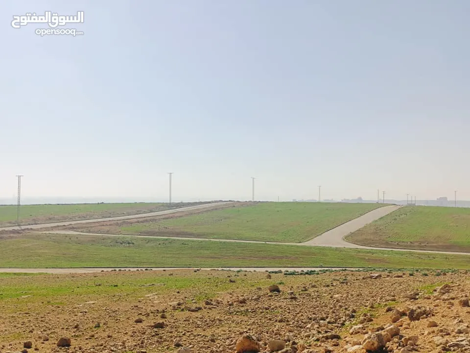 ارض  للبيع طريق المطار القسطل مساحه 400م ضمن مشروع بوابة عمان استثماريه