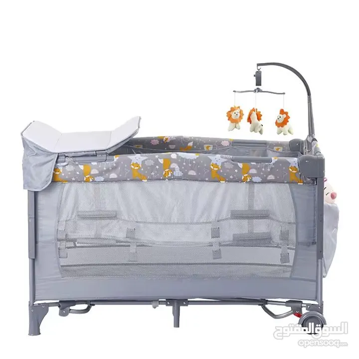 تخت بيبي من island toys امريكي فخم جدا مع كامل الاضافات next to me جنب متحرك وعلاقه العاب وعجلات
