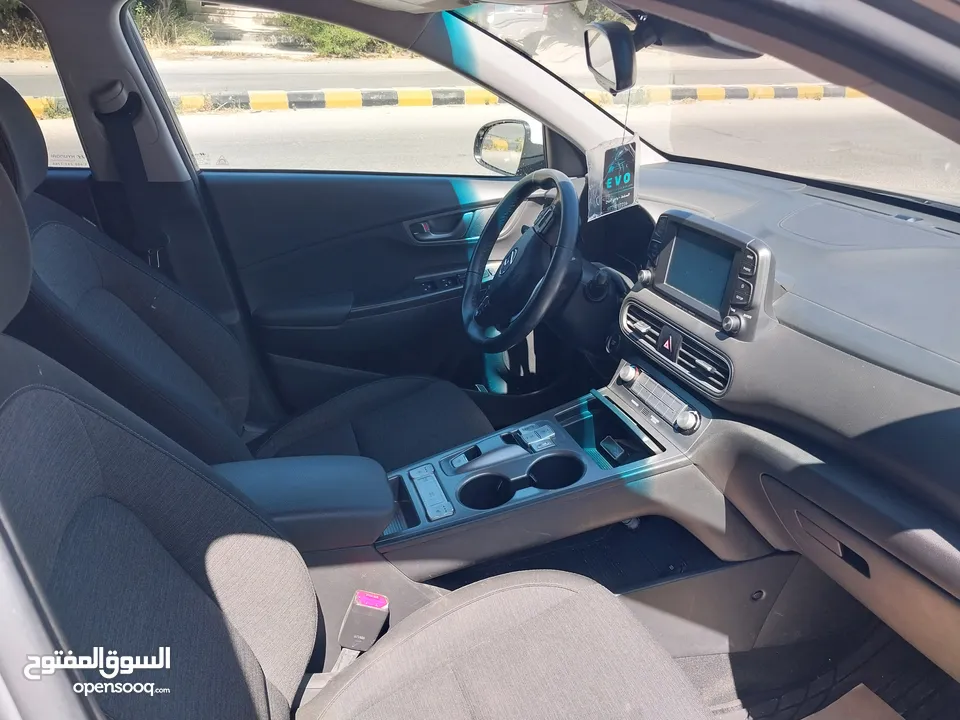 هونداي كونا موديل 2021 وارد أمريكي لون اسمنتي قاطعه 28 ألف سقف ابيض بريميوم اصلي