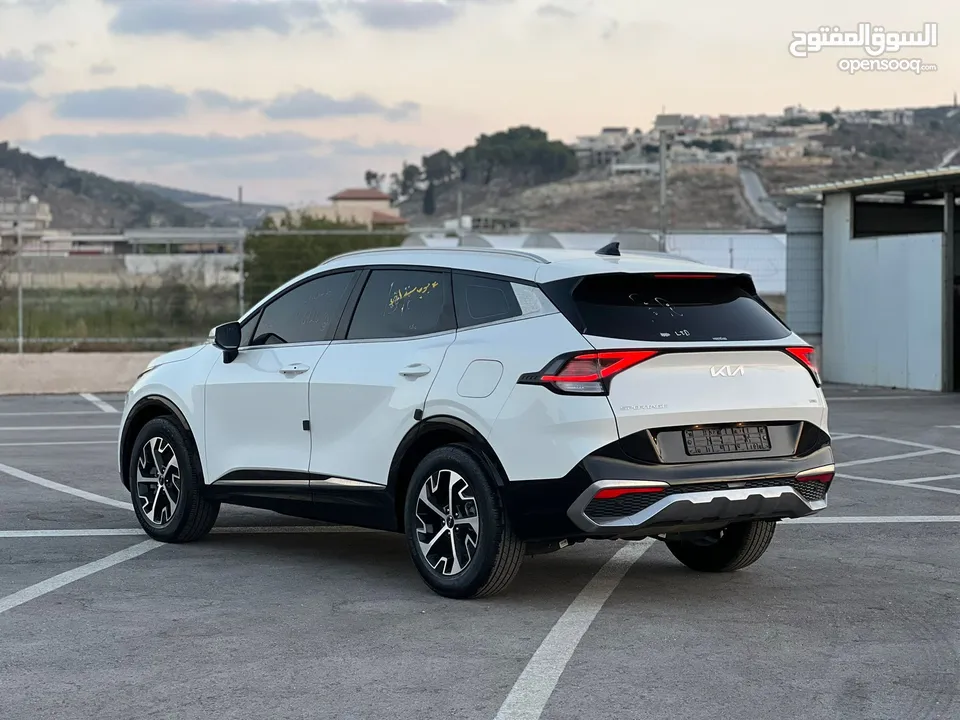 كايا سبورتاج /2022 فل بدون فتحة سقف  2x4 ///240Hp بنزين + كهرباء  ( Haybrid) 1600cc
