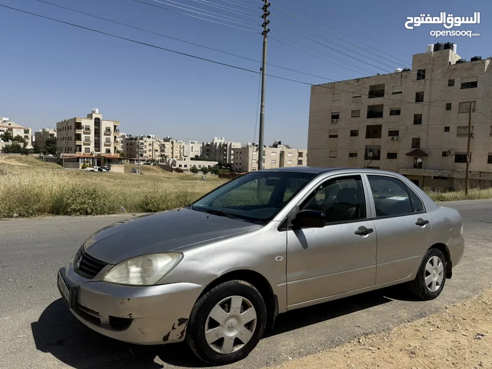 ميتسوبيشي لانسر موديل 2011 للبيع ماتور 1300 4500 دينار قابل للتفاوض