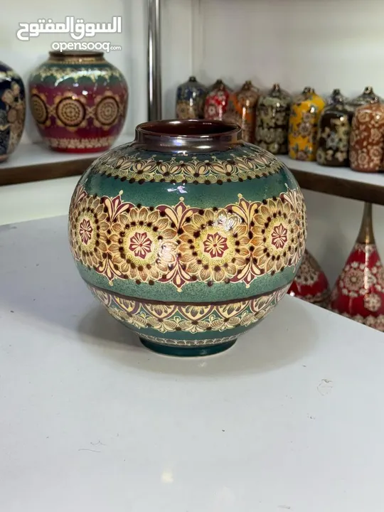 handmade ceramic vase with motifs and excellent glaze