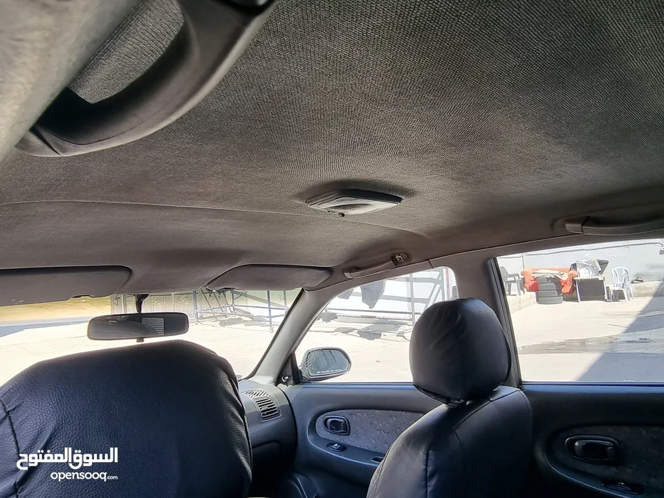 كيا سبيكترا 2001 بسعر 2400 جير عادي سياره نظيفه جدا  kia spectra 2001
