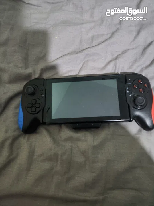 نينتندو سويتش مع كينترولارنينتندو سويتش مع كينترولارنينتندو سويتش مع كينترولار