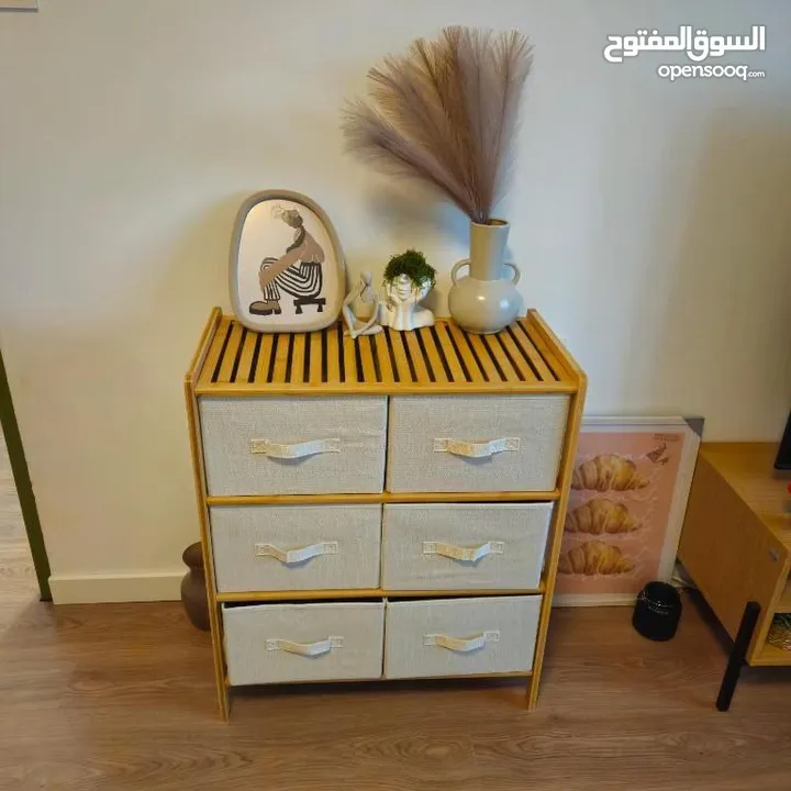 مع خزانة البامبو  بـ6 أدراج قماشية متينة تصميم طبيعي وراقي يناسب جميع الديكورات .