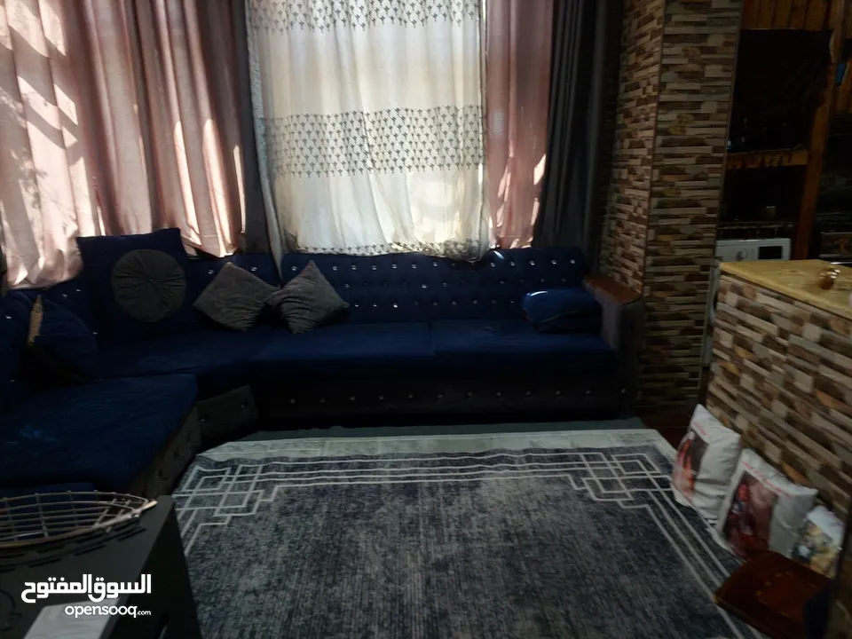 شقه ارضيه للبيع كاش او اقساط عن طريق البنك العربي الإسلامي الدولي في عمان حي نزال على الشارع الرئيسي
