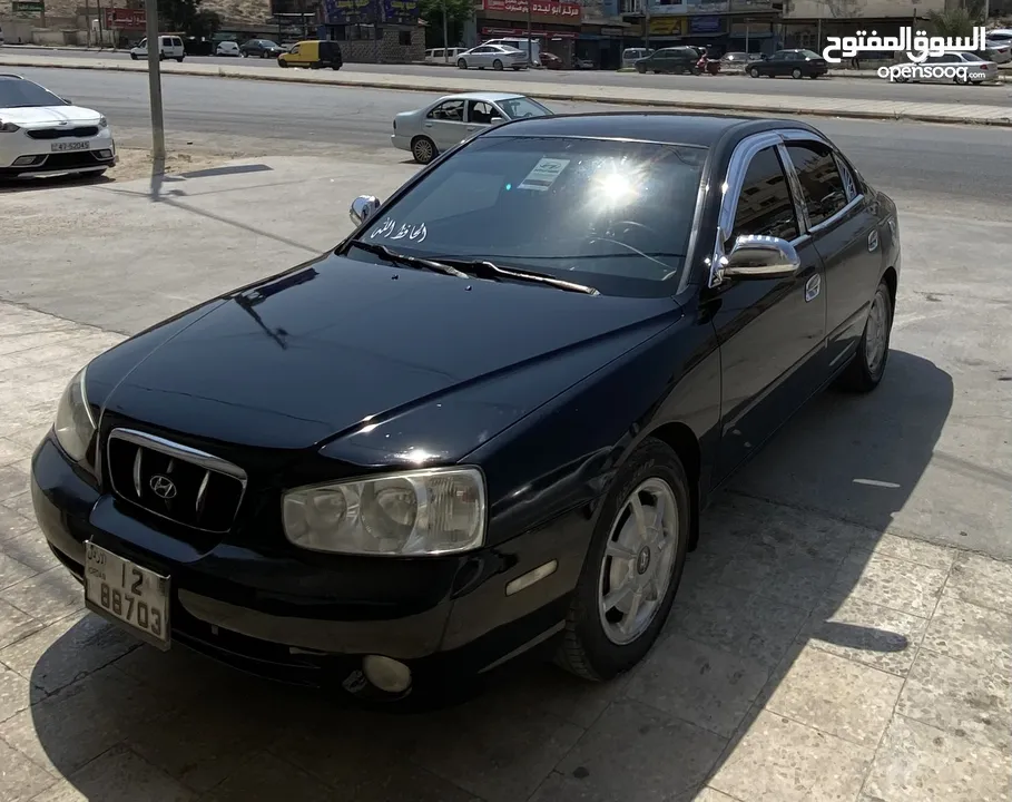 هيونداي افانتي xD لون اسود مميز ميتالك  موديل 2000