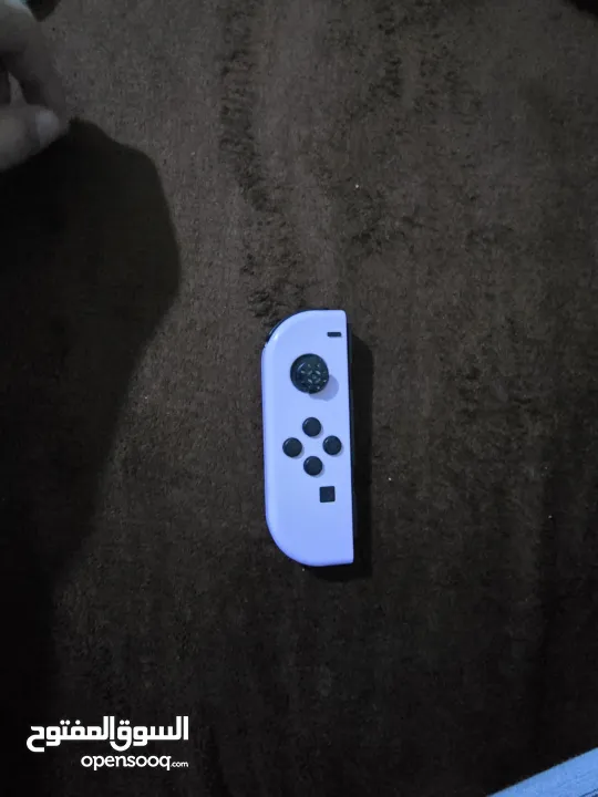 نينتندو سويتش مع 5 العاب super mario party و super mario wonder و super mario 3d world و ايد وكنترول