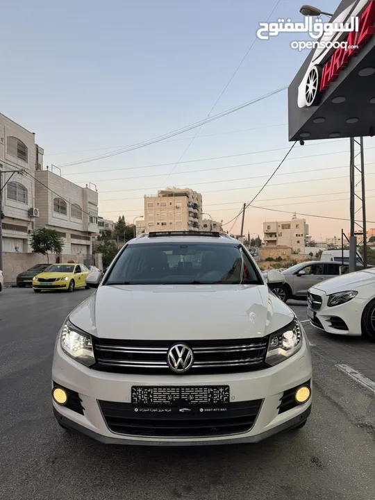 فوكس فاجن تيجوان 2012 بنزين متور 2000 تيربو 4x4 فتحة سقف بانوراما فرش بني مميز عداد قليل فحص ممتاز