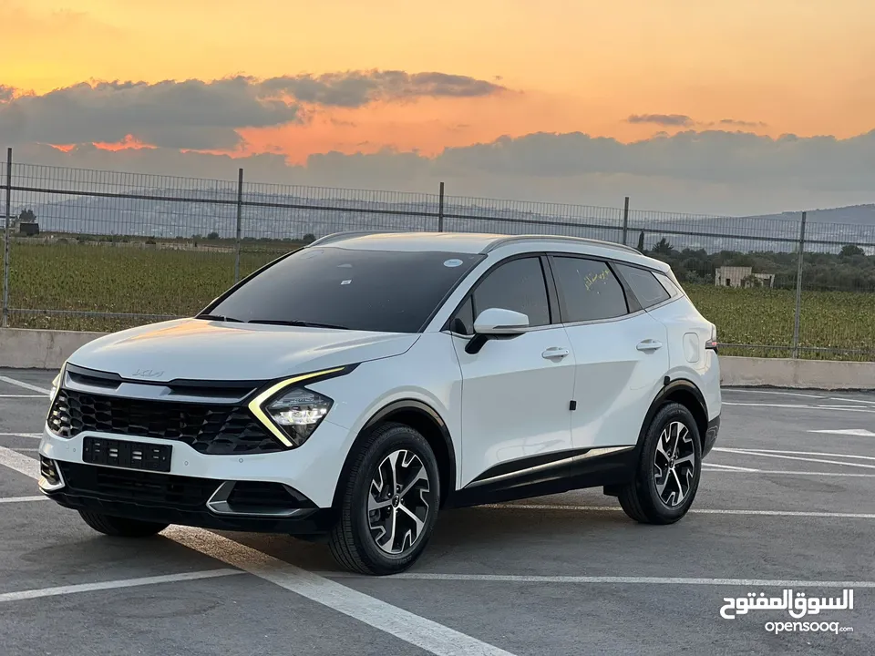 كايا سبورتاج /2022 فل بدون فتحة سقف  2x4 ///240Hp بنزين + كهرباء  ( Haybrid) 1600cc
