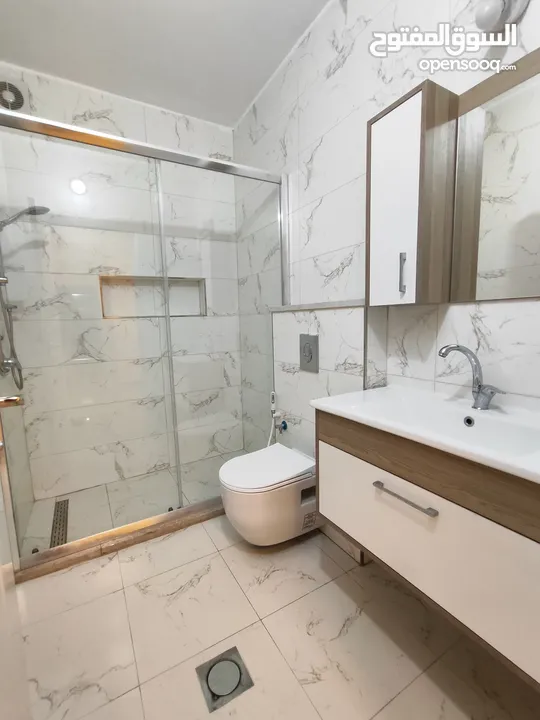 شقة جديده سوبر ديلوكس غير مفروش للايجار في الماصيون