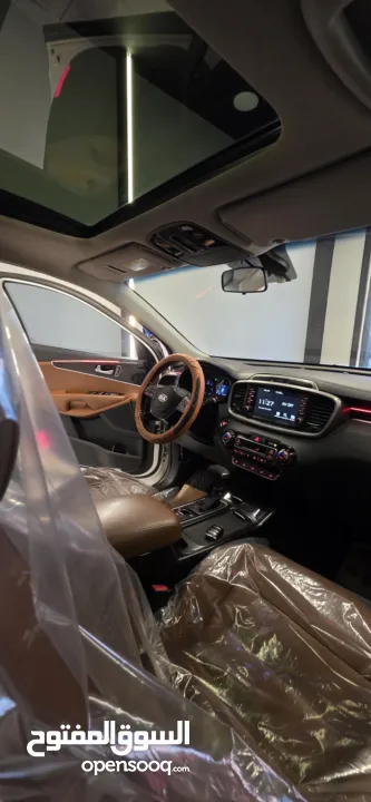 من اجمل كيا سورينتو فل ملغم دفع رباعي بحاله الشركه