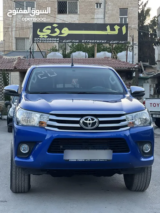 تويوتا هيلوكس 2020 دهان الشركه فحص كامل وله ملاحضه ممشى قليل لون مميز