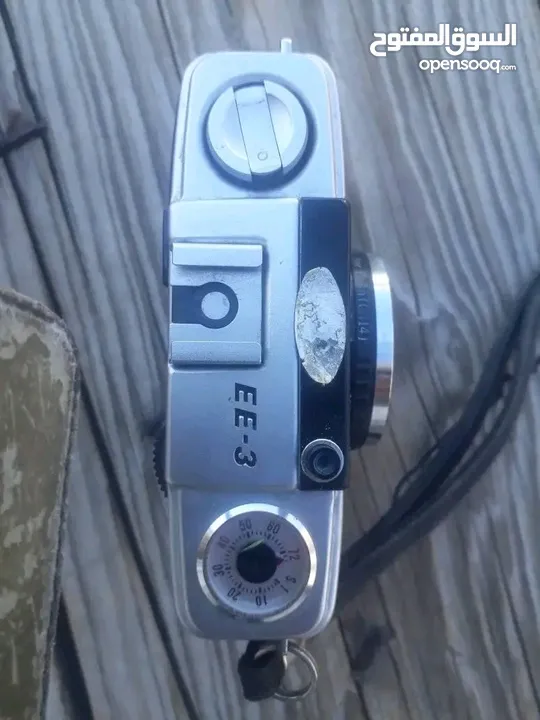 polarid sx70 & OLYMPUS & KODAK DISC