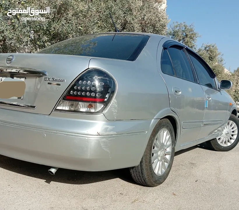نيسان صني ياباني 2001 محدثة 2012  فل اوتوماتيك عدا الفتحة لون سلفر
