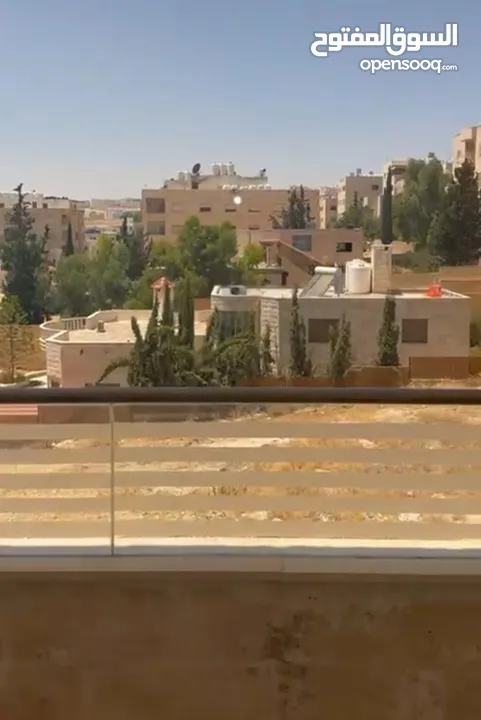 Excellent natural light and winds with views of Shafa Badran from the highest level in the building.