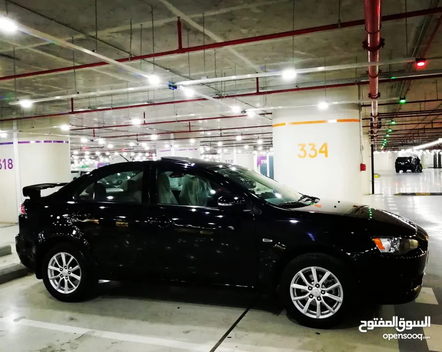 ميتسوبيشي لانسر EX 2016 gls اصلي وارد شركة مالك ثاني اضافات كاملة بحالة ممتازة جدا