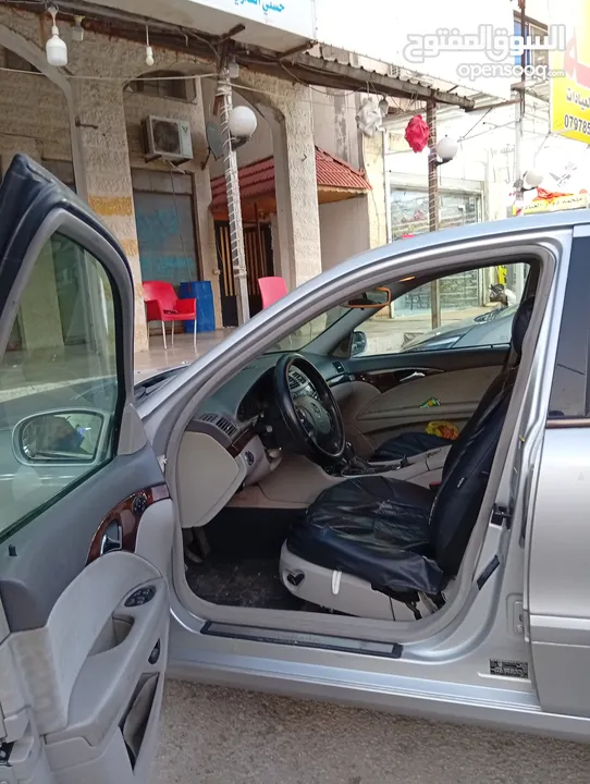 مرسيدس للبدل على احدث e200 كرت ابيض 2004